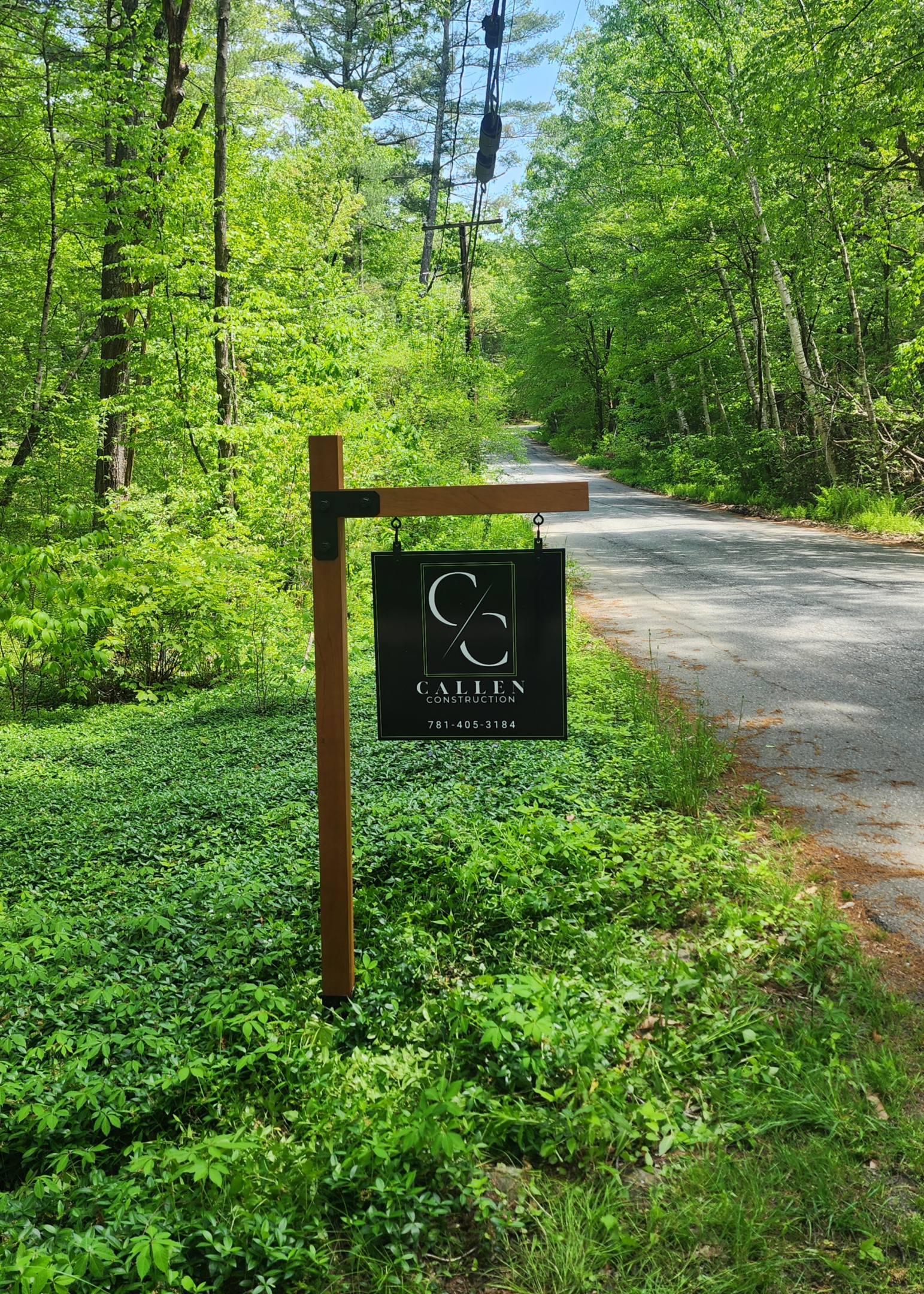 A sign that is on the side of a road.