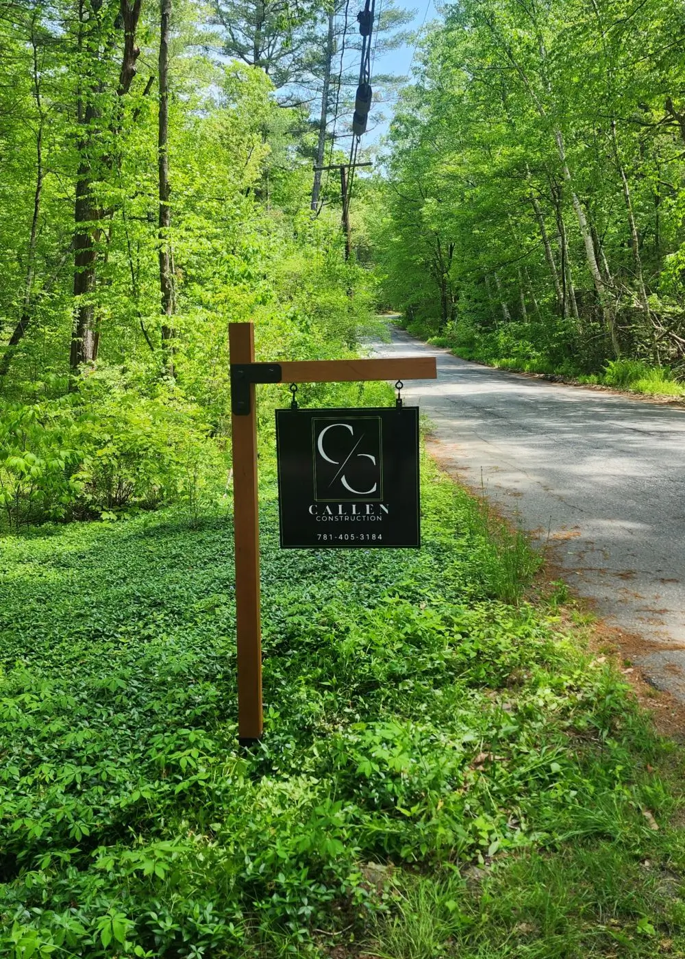 A sign that is on the side of a road.